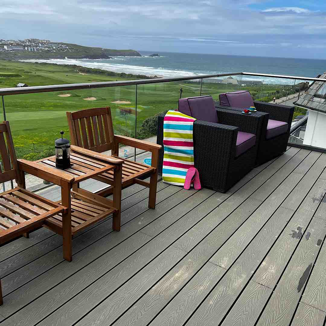 Balcony accessed from all bedrooms with spectacular views across Newquay golf course and the surf on Fistral Beach