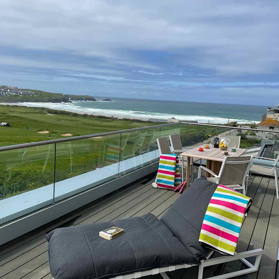 Large balcony providing outside dining in a self catering apartment with spectacular seaviews across Newquay golf course and Fistral Beach