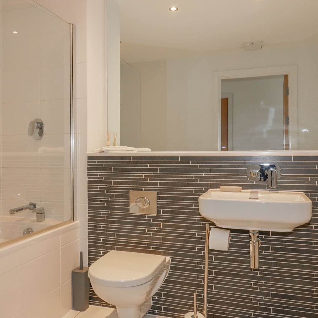 Modern Family Bathroom with shower in this stylish self catering apartment 